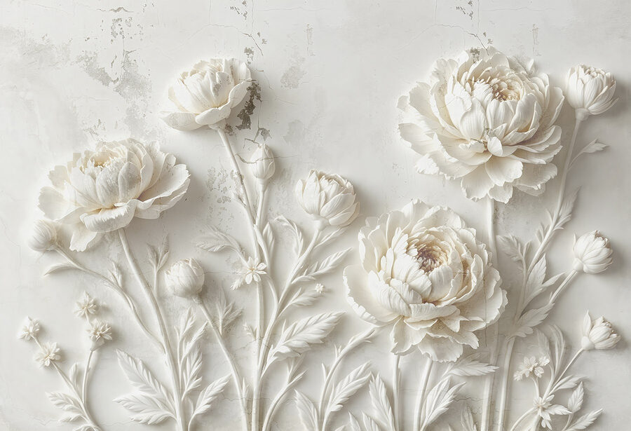 Sculpture de fleurs blanches sur un mur Sculpture de fleurs blanches sur un mur