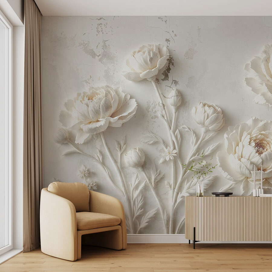 Sculpture de fleurs blanches sur un mur Sculpture de fleurs blanches sur un mur