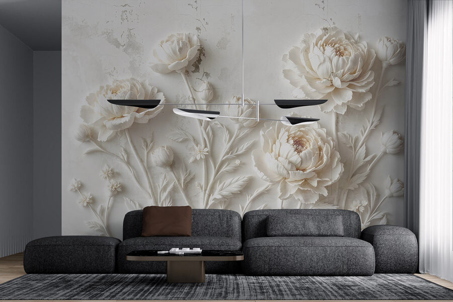 Sculpture de fleurs blanches sur un mur Sculpture de fleurs blanches sur un mur