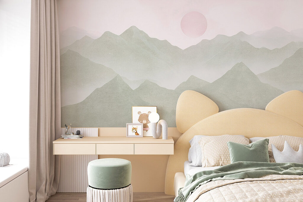 Mountain range with a sun in the distance