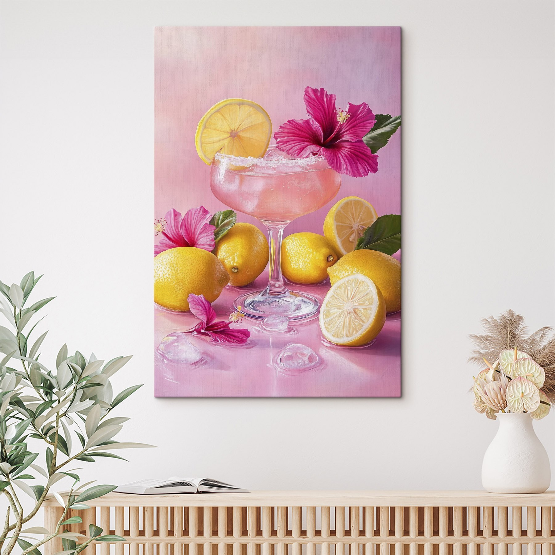 Glass with pink drink and lemons
