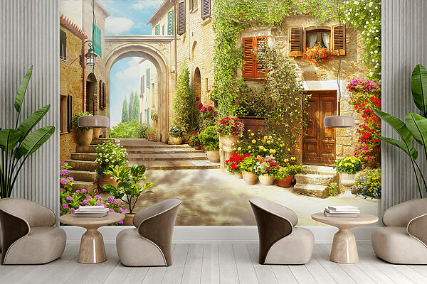 Bâtiment en pierre avec une porte et un portail avec des plantes en pots Bâtiment en pierre avec une porte et un portail avec des plantes en pots