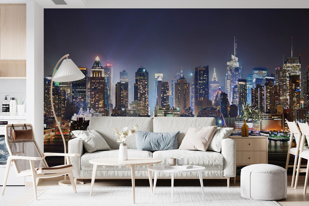 City skyline at night with lights reflecting on water City skyline at night with lights reflecting on water