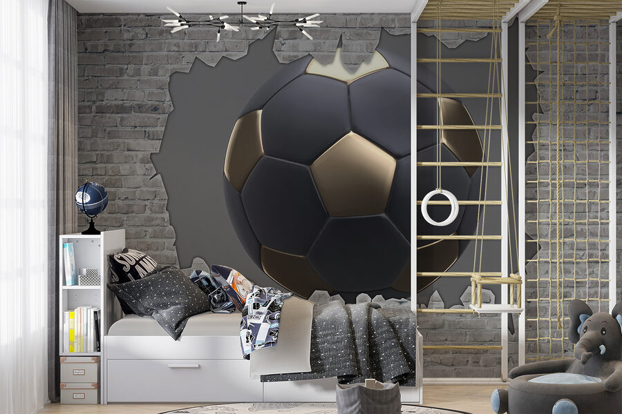 Un ballon de football traverse un mur Un ballon de football traverse un mur