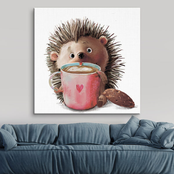Un hérisson tenant une tasse de café Un hérisson tenant une tasse de café