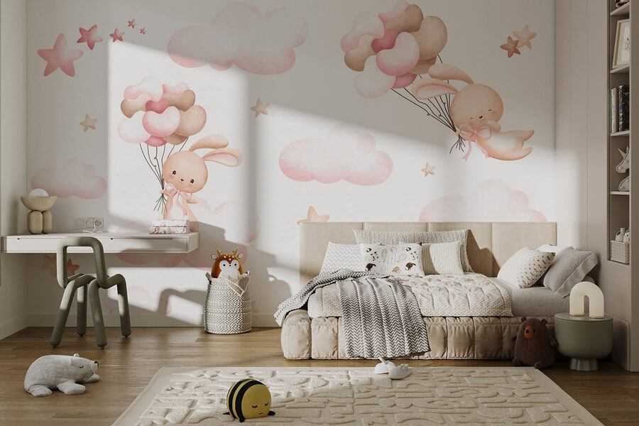 Groupe de nuages roses et lapin tenant des ballons