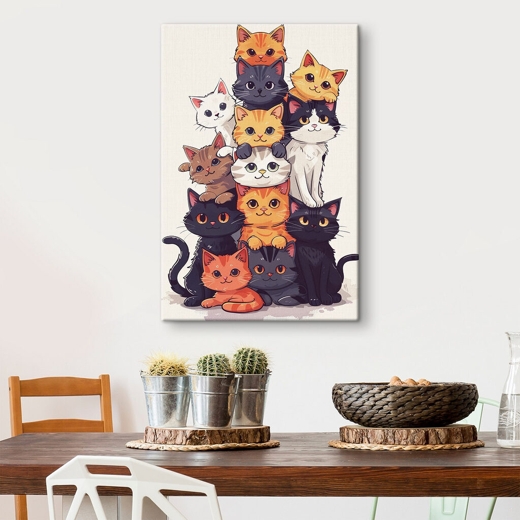 Group of cats stacked together