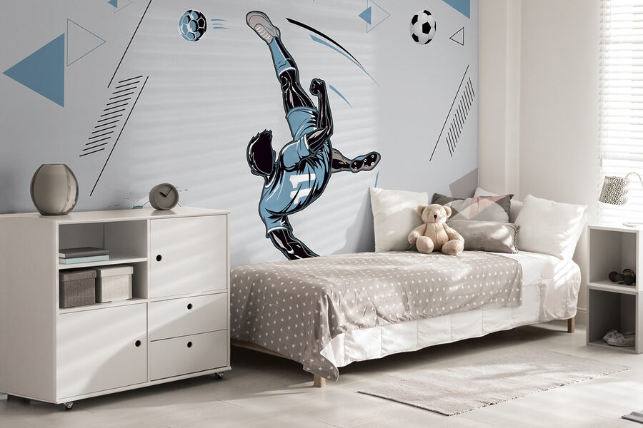 Un joueur de football bottant un ballon