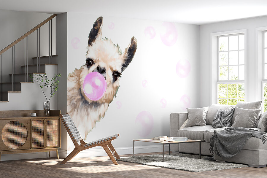 Un lama soufflant une bulle