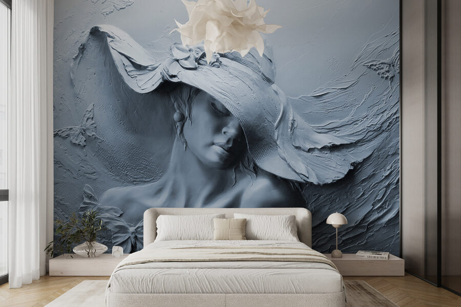 Sculpture d'une femme avec un chapeau
