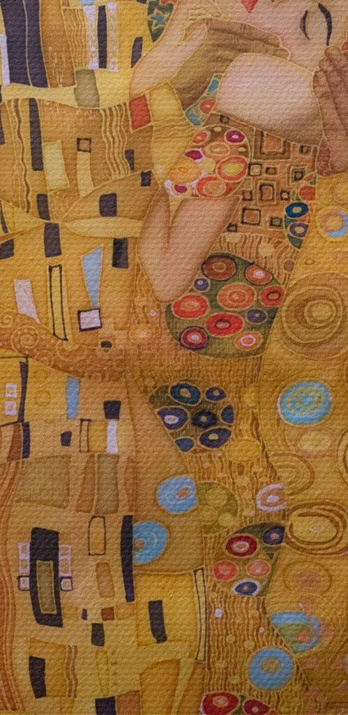 A painting of a man and woman kissing A painting of a man and woman kissing