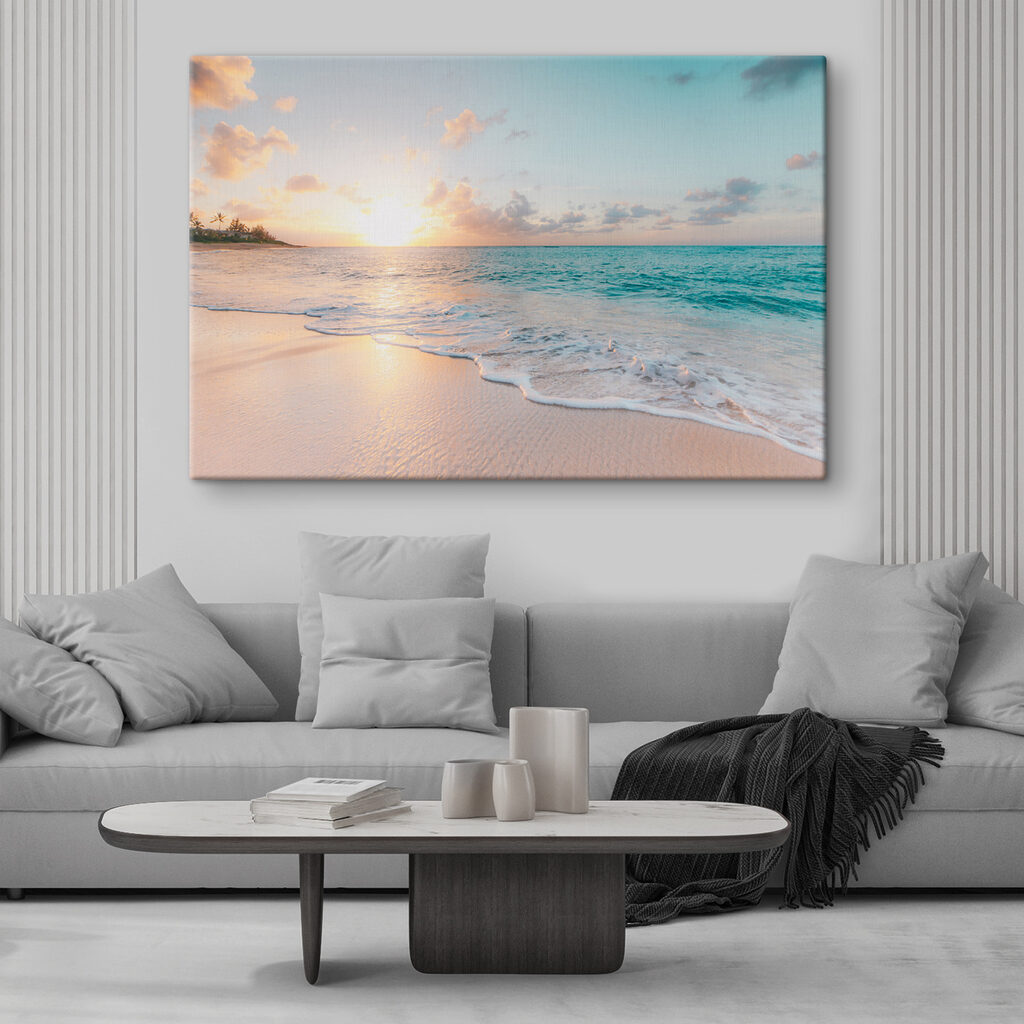 A beach with waves and a sunset