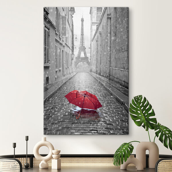 Un parapluie rouge dans une rue avec une tour en arrière-plan Un parapluie rouge dans une rue avec une tour en arrière-plan