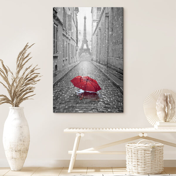 Un parapluie rouge dans une rue avec une tour en arrière-plan Un parapluie rouge dans une rue avec une tour en arrière-plan