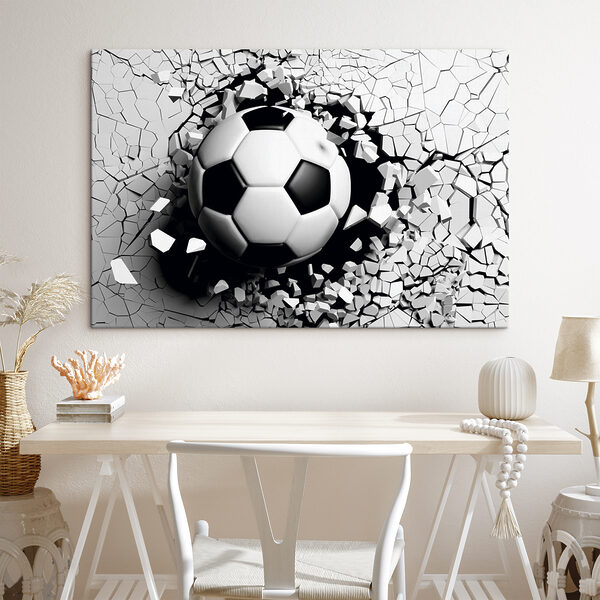 Un ballon de football qui traverse un mur Un ballon de football qui traverse un mur