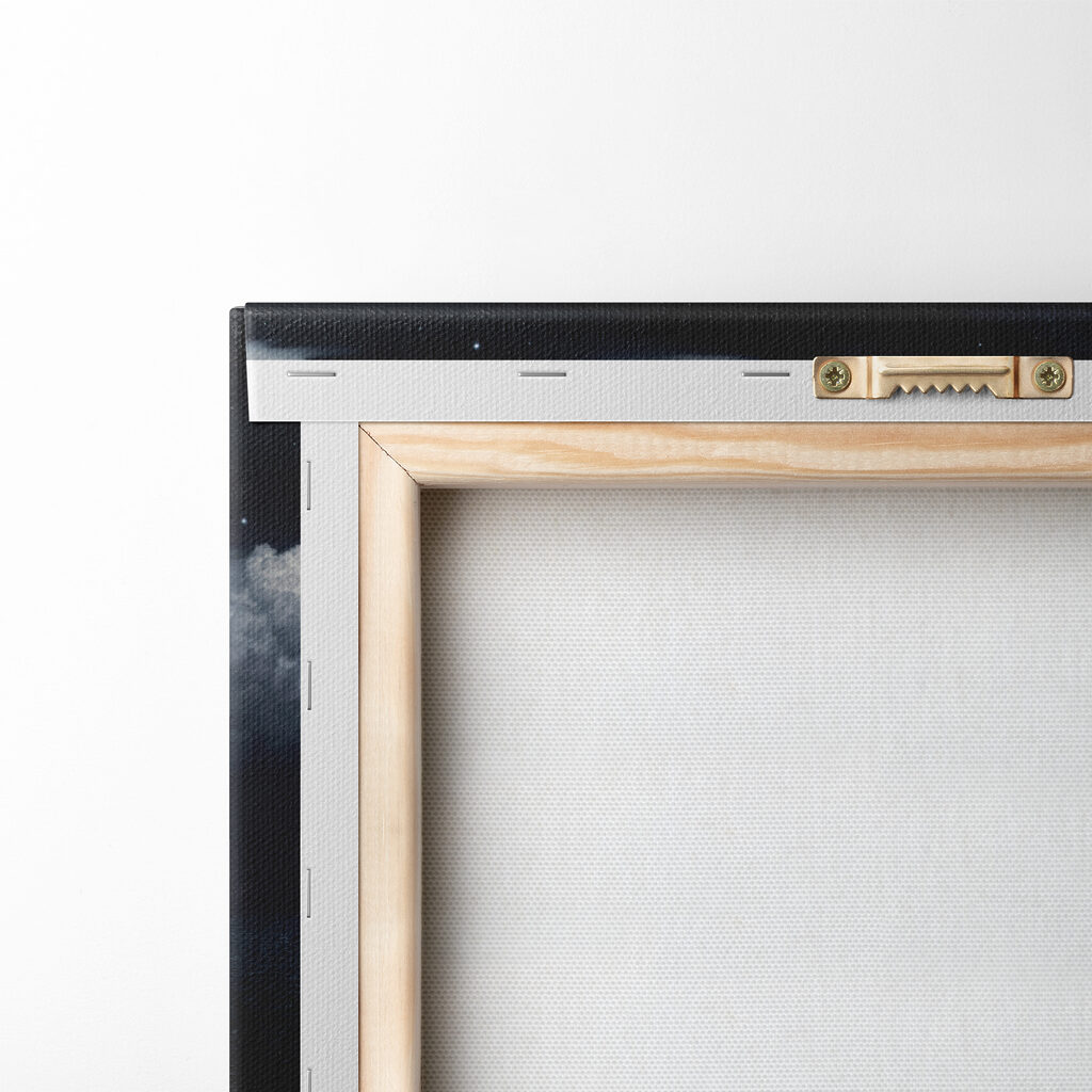 A moon over water at night