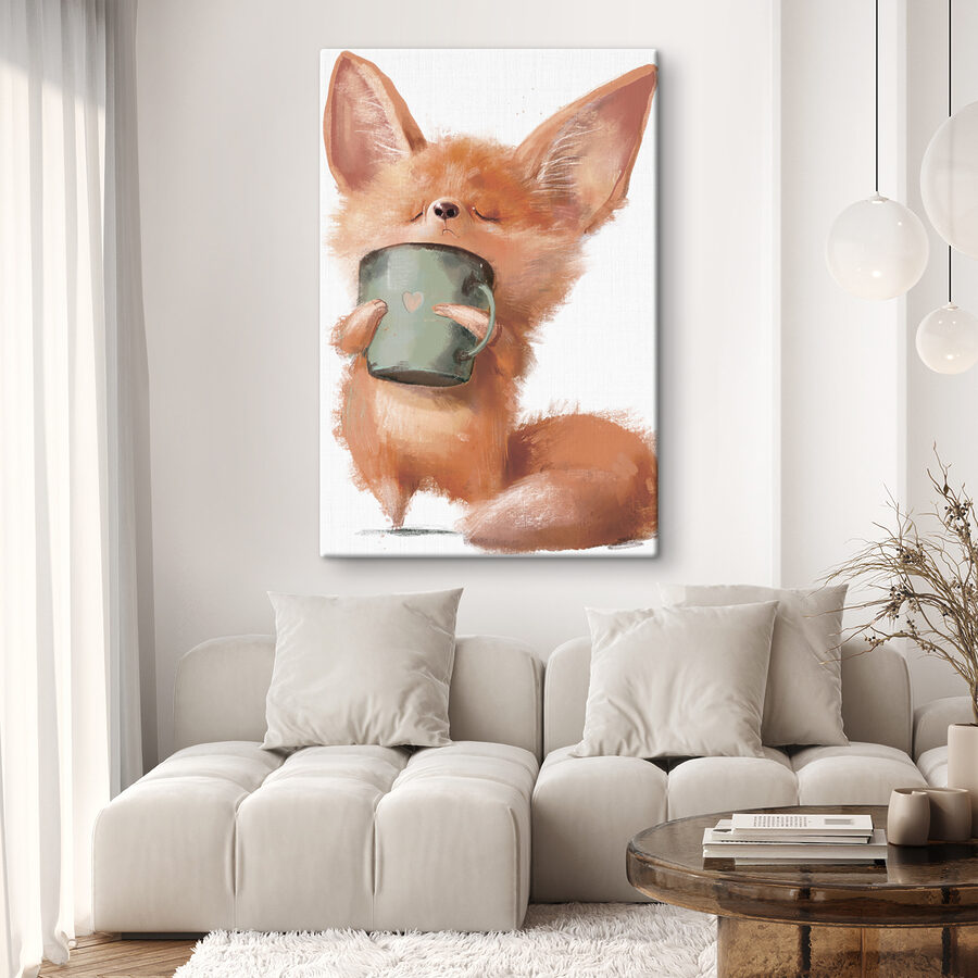 Un renard tenant une tasse