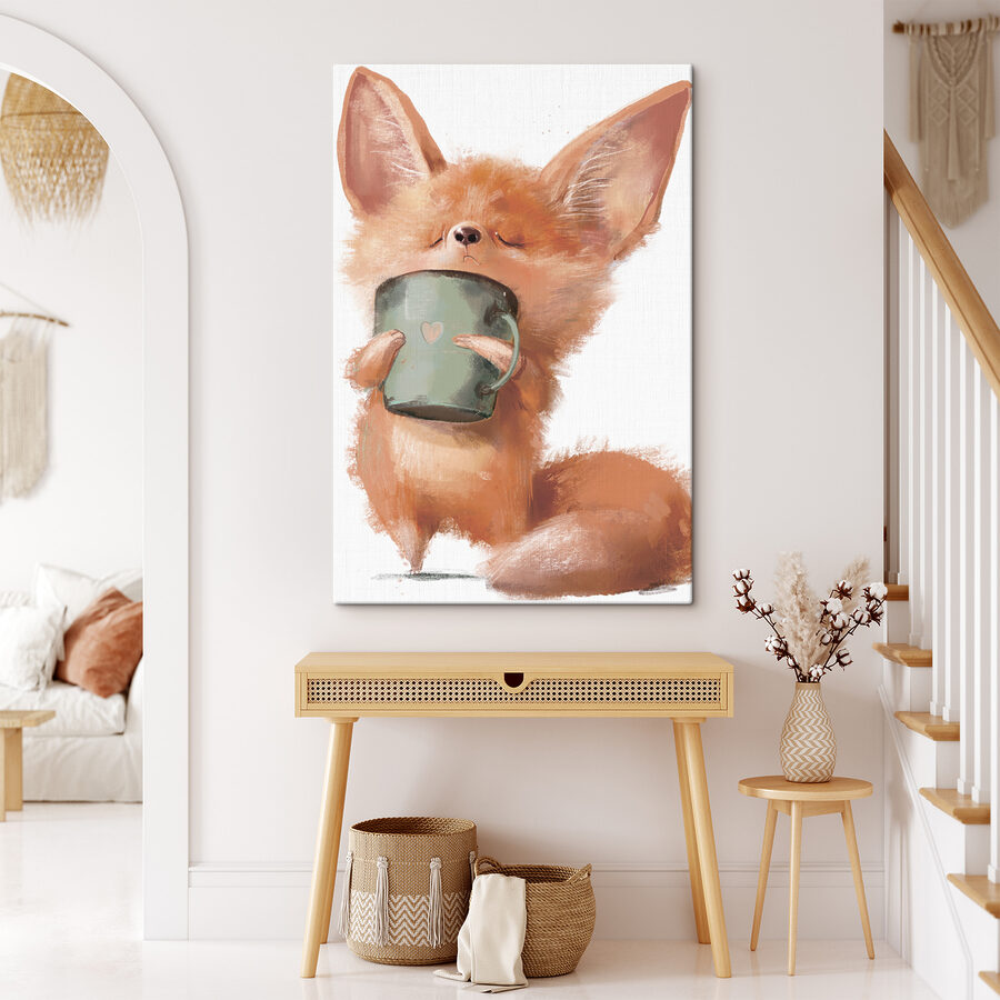 Un renard tenant une tasse