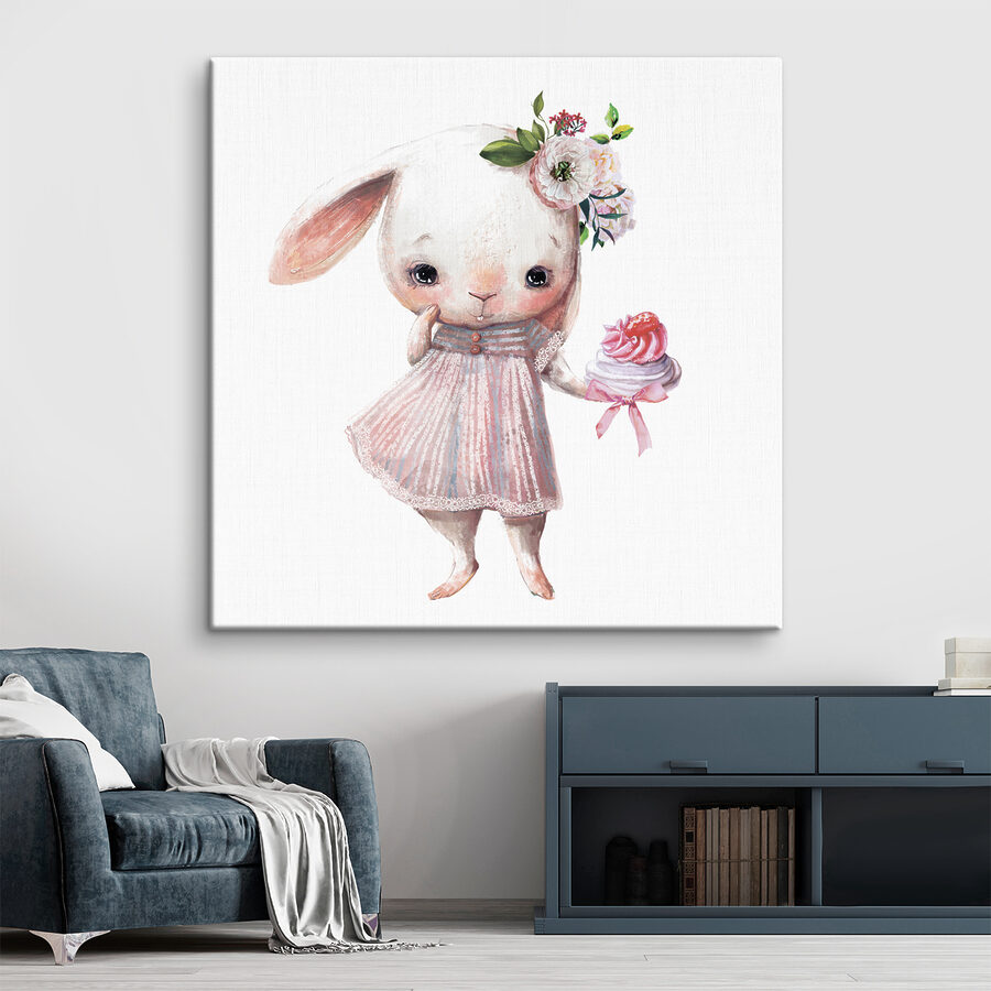Dessin humoristique d'un lapin tenant un petit gâteau
