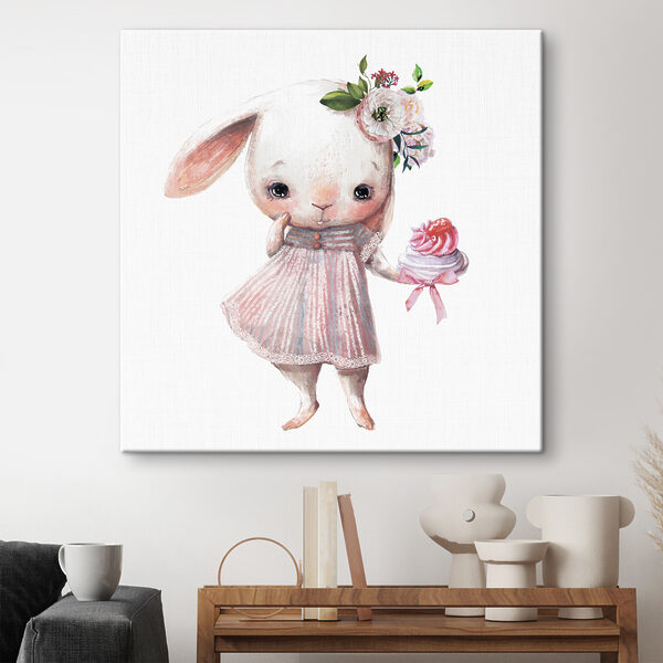 Dessin humoristique d'un lapin tenant un petit gâteau Dessin humoristique d'un lapin tenant un petit gâteau