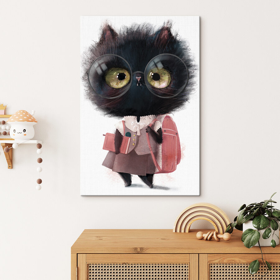 Un chat portant des lunettes et un uniforme d'écolier