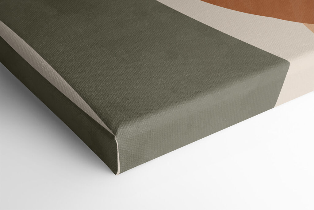 A black leaf on a branch with circles and circles