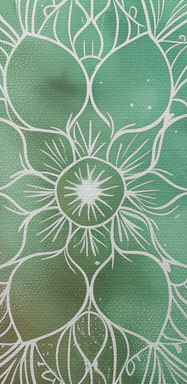 Un mandala blanc sur fond vert et bleu Un mandala blanc sur fond vert et bleu