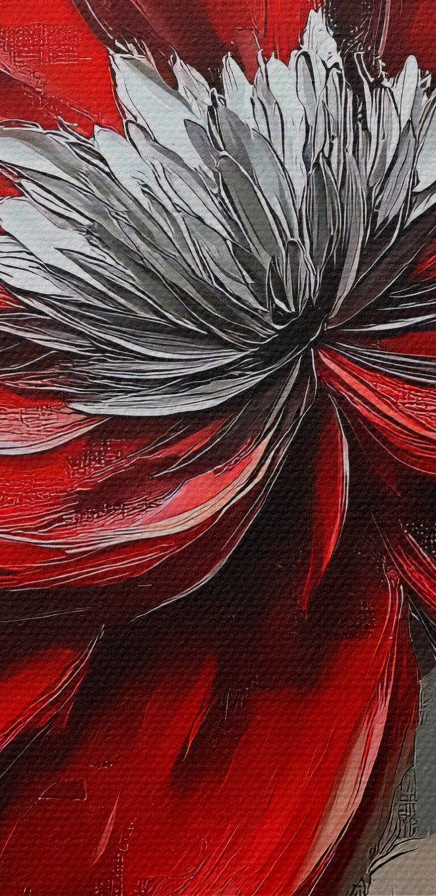 Fleur rouge sur une surface grise