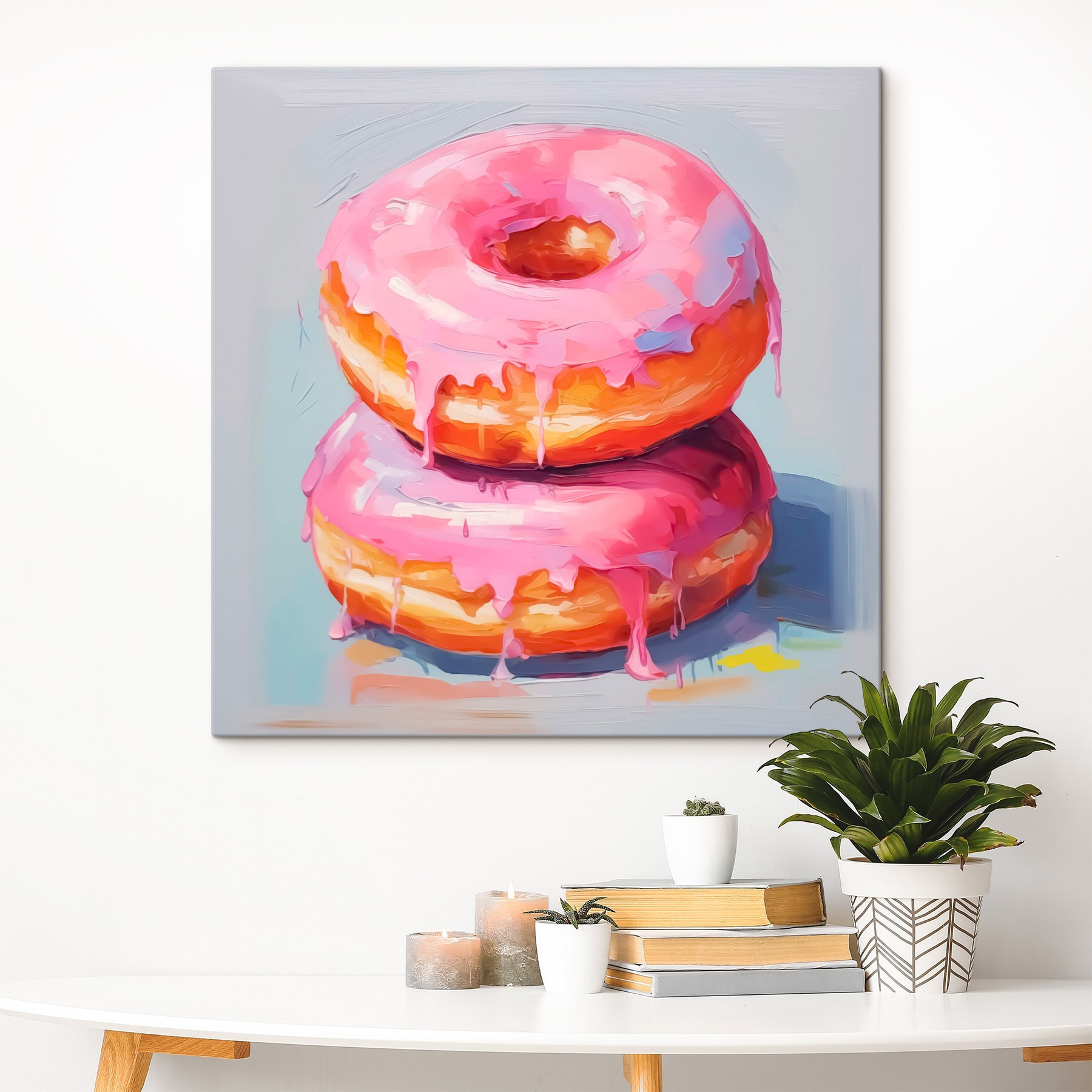 Two donuts with pink frosting Two donuts with pink frosting
