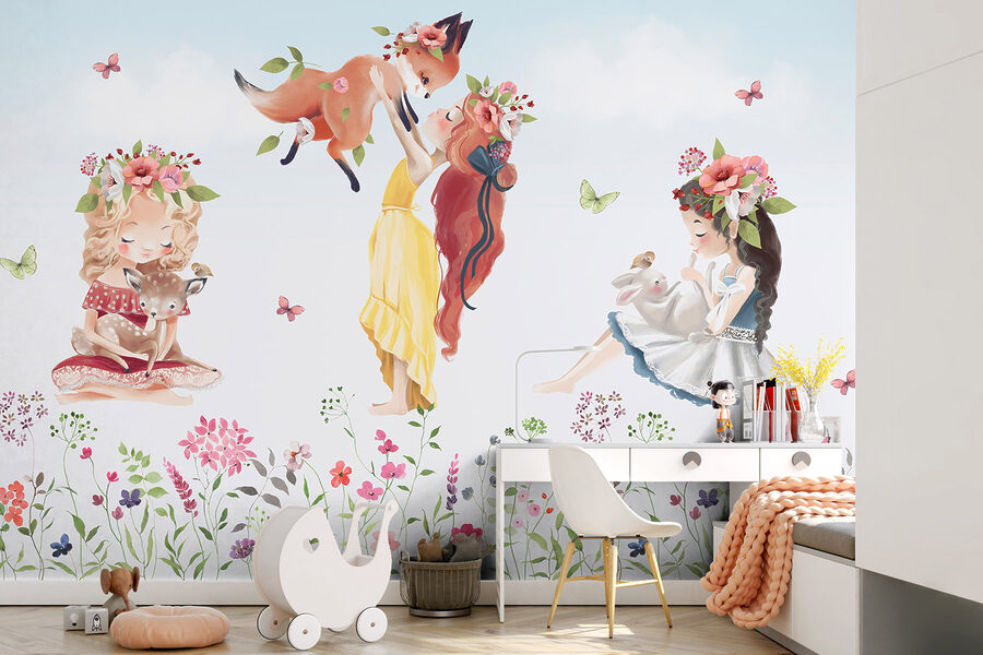 Groupe de filles tenant des animaux dans un champ de fleurs