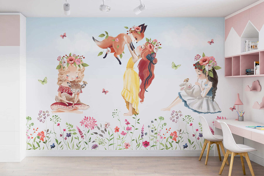 Groupe de filles tenant des animaux dans un champ de fleurs