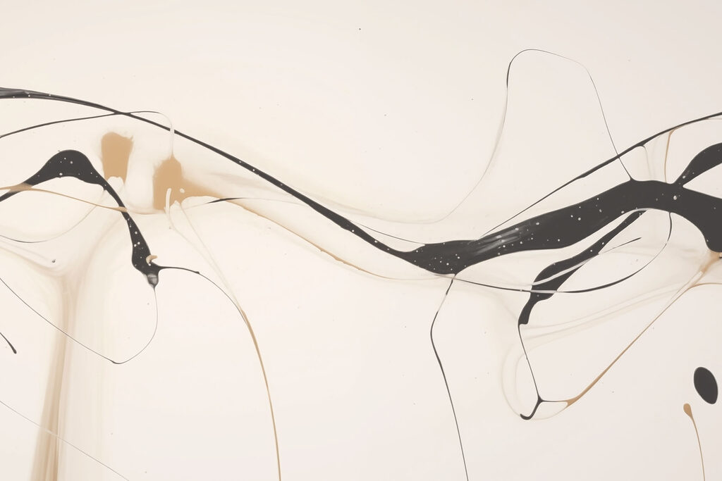 Peinture noire et beige sur une surface blanche Peinture noire et beige sur une surface blanche