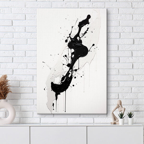 Peinture noire et blanche éclaboussée sur une surface blanche Peinture noire et blanche éclaboussée sur une surface blanche