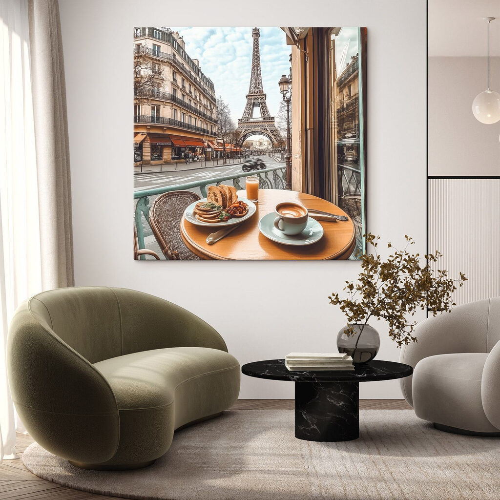 Table with a plate of food and a cup of coffee on it