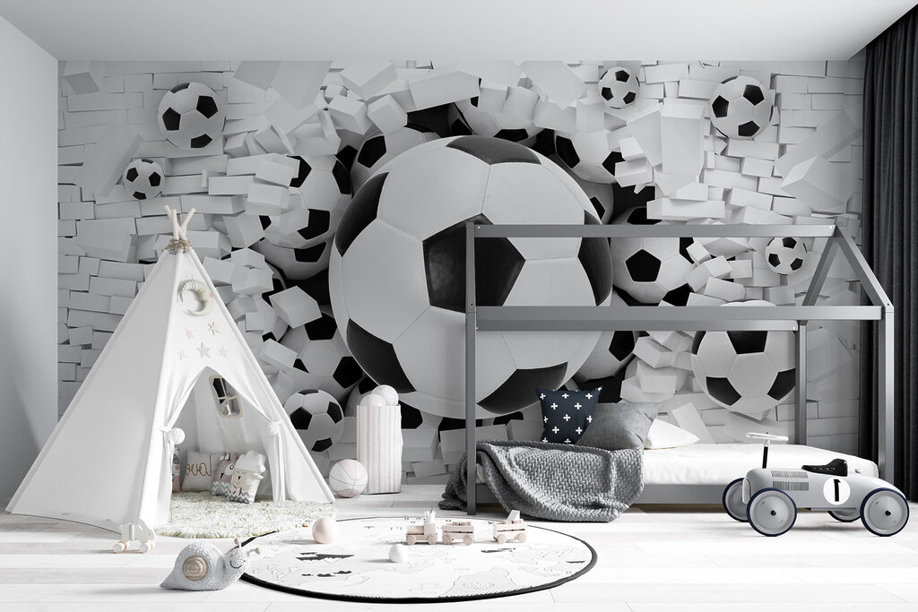 Group of football balls in a pile of bricks