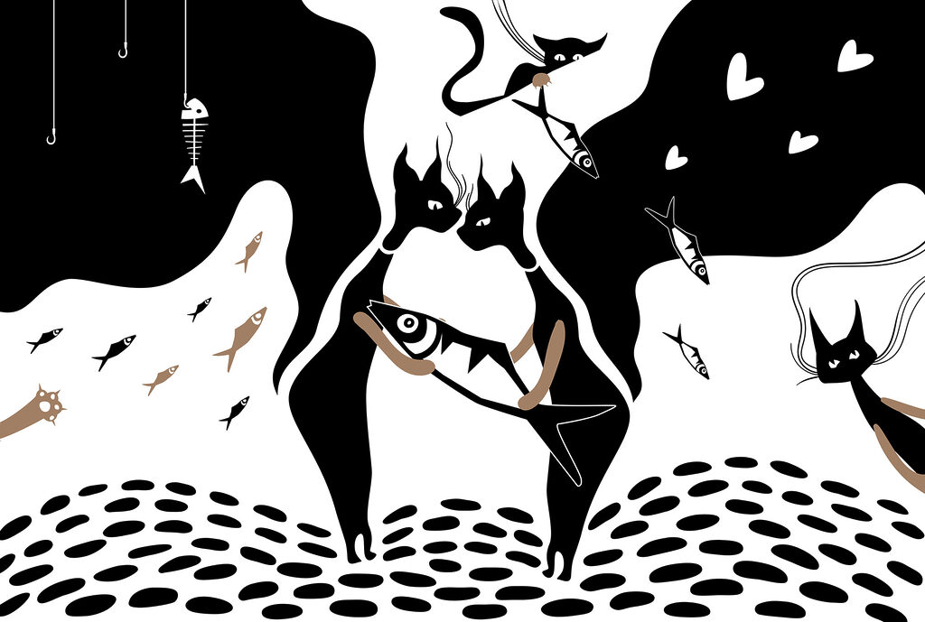 Chat noir et blanc avec poisson et poisson Chat noir et blanc avec poisson et poisson