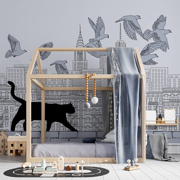 Chat marchant sur un mur avec des oiseaux volant dans le ciel Chat marchant sur un mur avec des oiseaux volant dans le ciel