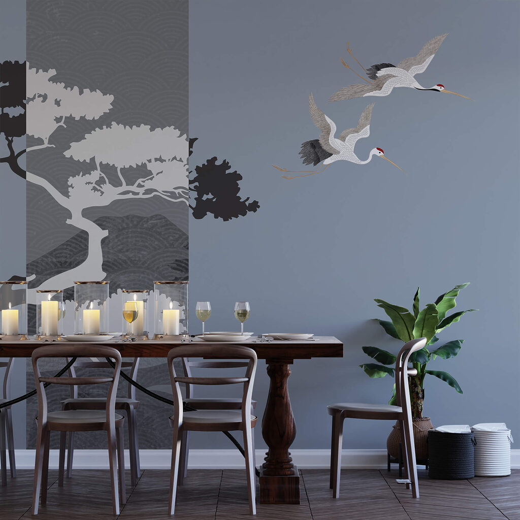 Couple de grues volant près d'un arbre Couple de grues volant près d'un arbre