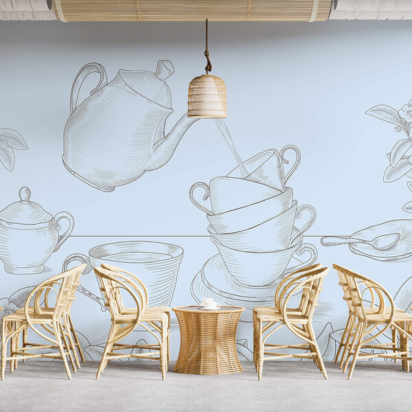 Théière versant dans une pile de tasses à thé