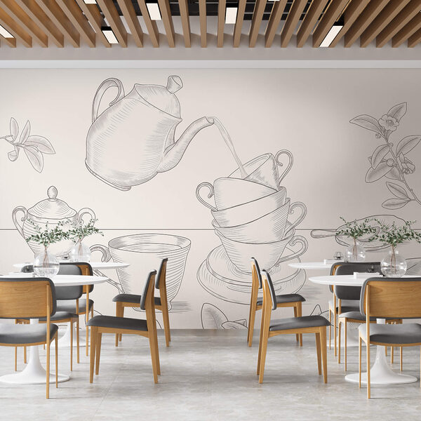 Théière versant dans une pile de tasses à thé Théière versant dans une pile de tasses à thé