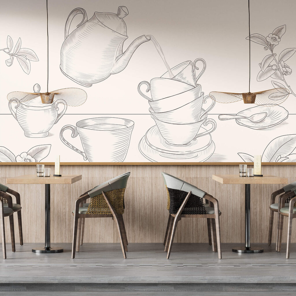 Théière versant dans une pile de tasses à thé Théière versant dans une pile de tasses à thé