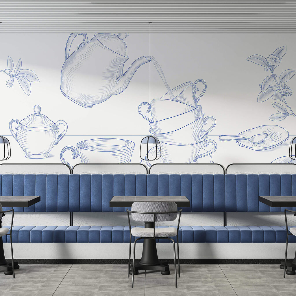 Théière versant dans une pile de tasses à thé Théière versant dans une pile de tasses à thé