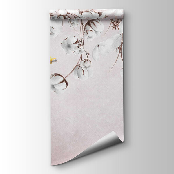 Bird flying over cotton flowers