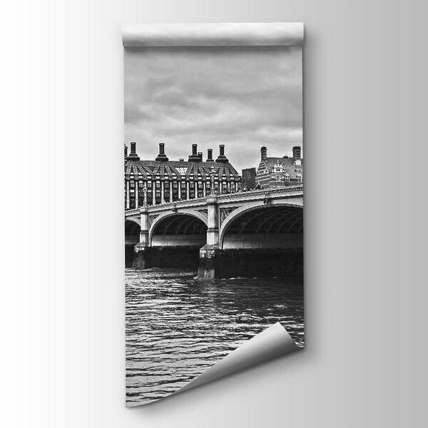 Bridge over water with a clock tower and a red bus Bridge over water with a clock tower and a red bus