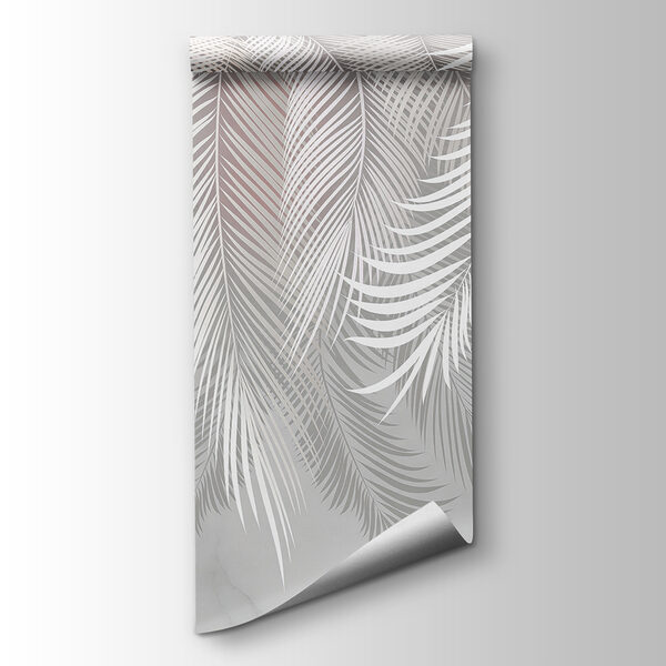 White feathers on a marble surface