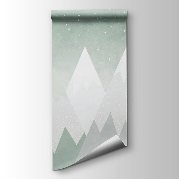 Mountain range with snow falling