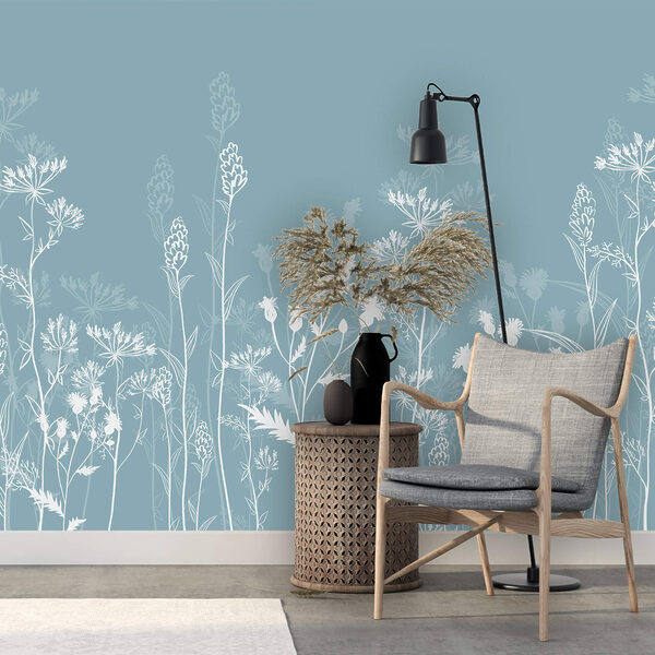 Des fleurs blanches sur fond bleu