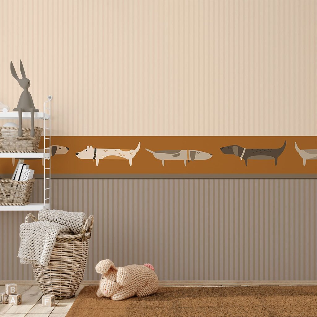 Une rangée de chiens sur un mur Une rangée de chiens sur un mur