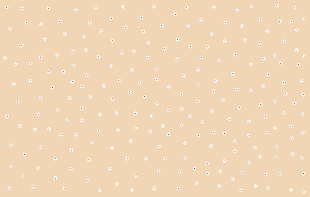 Pattern of small white flowers on a tan background Pattern of small white flowers on a tan background