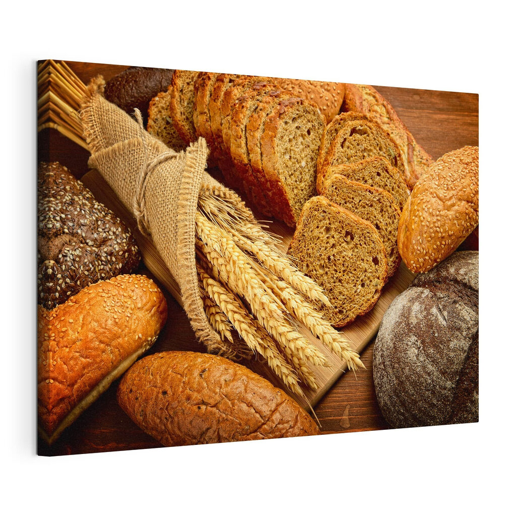 A group of bread on a cutting board A group of bread on a cutting board